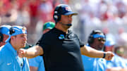 Sep 14, 2024; Norman, Oklahoma, USA;  Tulane Green Wave head coach Jon Sumrall reacts during the first half against the Oklahoma Sooners at Gaylord Family-Oklahoma Memorial Stadium. Mandatory Credit: Kevin Jairaj-Imagn Images