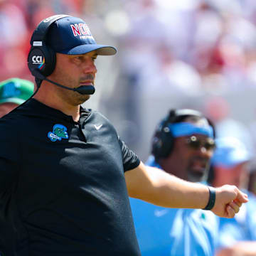 Sep 14, 2024; Norman, Oklahoma, USA;  Tulane Green Wave head coach Jon Sumrall reacts during the first half against the Oklahoma Sooners at Gaylord Family-Oklahoma Memorial Stadium. Mandatory Credit: Kevin Jairaj-Imagn Images