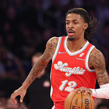 Jan 27, 2025; New York, New York, USA; Memphis Grizzlies guard Ja Morant (12) dribbles up court during the first half against the Memphis Grizzlies at Madison Square Garden. Mandatory Credit: Vincent Carchietta-Imagn Images