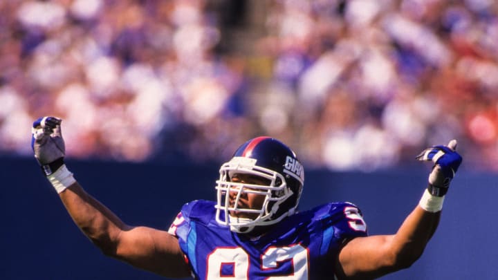 Sep 6, 1998; East Rutherford, NJ, USA; FILE PHOTO; New York Giants defensive end Michael Strahan (92) in action against the Washington Redskins at Giants Stadium.  