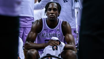 Mar 13, 2024; Kansas City, MO, USA; Kansas State Wildcats forward Arthur Kaluma (24) in the huddle during a timeout in the first half against the Texas Longhorns at T-Mobile Center. Mandatory Credit: William Purnell-USA TODAY Sports