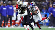 Dec 17, 2023; New Orleans, Louisiana, USA; New Orleans Saints wide receiver A.T. Perry (17) is tackled by New York Giants cornerback Adoree' Jackson (22) during the second half at Caesars Superdome. Mandatory Credit: Stephen Lew-Imagn Images