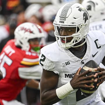 Sep 7, 2024; College Park, Maryland, USA;  Michigan State Spartans quarterback Aidan Chiles (2) rolls pit top pass during the first half against the Maryland Terrapins at SECU Stadium. Mandatory Credit: Tommy Gilligan-Imagn Images