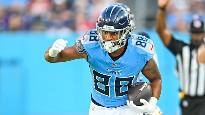 Aug 10, 2024; Nashville, Tennessee, USA;  Tennessee Titans tight end David Martin-Robinson (88) runs through San Francisco 49ers cornerback Rock Ya-Sin (33) during the first half at Nissan Stadium. Mandatory Credit: Steve Roberts-Imagn Images