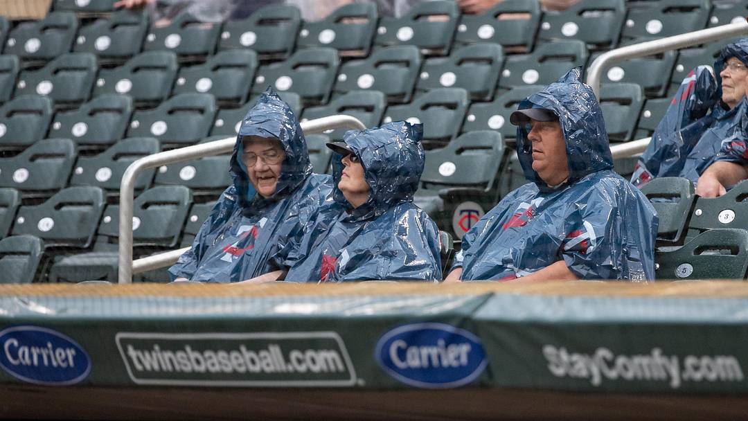 Jul 5, 2019; Minneapolis, MN, USA; Fans look on during the rain delay prior to the game between the Texas Rangers and the Minnesota Twins at Target Field. Mandatory Credit: Jordan Johnson-Imagn Images