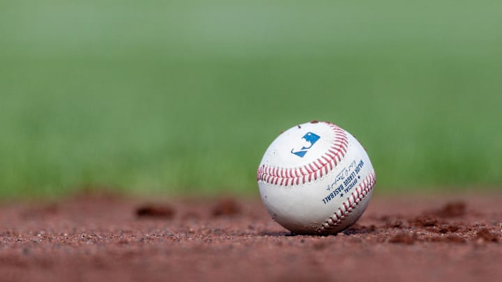 Jul 27, 2025; San Francisco, California, USA; A MLB baseball sits on the infield during the game between the San Francisco Giants and the New York Mets at Oracle Park. Mandatory Credit: Bob Kupbens-Imagn Images