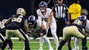 Aug 23, 2025; New Orleans, Louisiana, USA; Denver Broncos quarterback Bo Nix (10) calls for the ball against New Orleans Saints linebacker Demario Davis (56) during the first half at Caesars Superdome. 