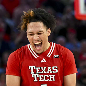 Feb 1, 2025; Houston, Texas, USA; Texas Tech Red Raiders forward Darrion Williams (5) reacts after shooting a three point basket to tie the game with seconds left on the clock against the Houston Cougars at Fertitta Center. Mandatory Credit: Maria Lysaker-Imagn Images 