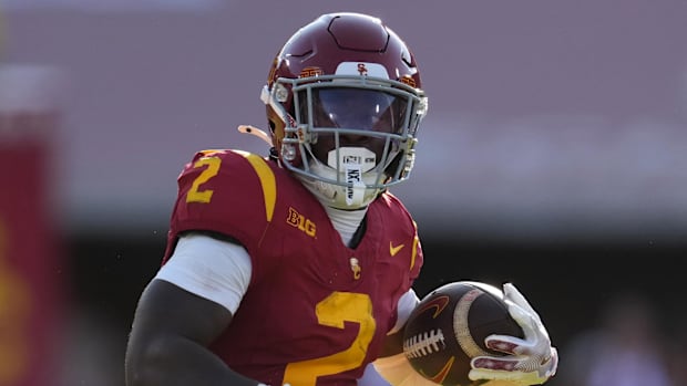 USC Trojans coach Lincoln Riley Michigan Wolverines coach Sherrone Moore Big Ten football College Football Playoff