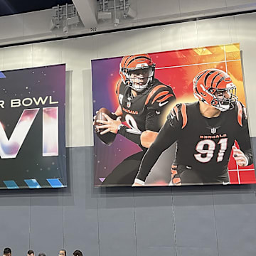 Feb 7, 2022; Los Angeles, CA, USA; Signage with the likeness of Los Angeles Rams players Matthew Stafford and Von Miller with Cincinnatti Bengals players Joe Burrow and Trey Hendrickson displayed at the Super Bowl LVI media center at Los Angeles Convention Center. Mandatory Credit: Gary A. Vasquez-Imagn Images