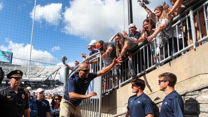 Penn State coach James Franklin celebrates with the students following a Nittany Lions victory at Beaver Stadium.