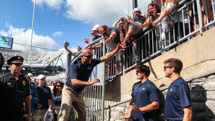 Penn State football coach James Franklin celebrates with the students following a Nittany Lions victory at Beaver Stadium. 