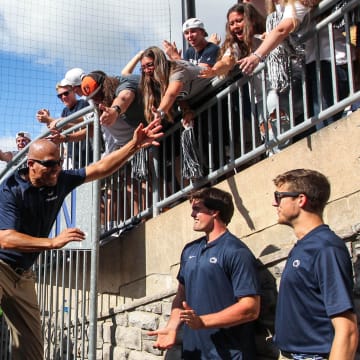 Penn State football coach James Franklin celebrates with the students following a Nittany Lions victory at Beaver Stadium. 