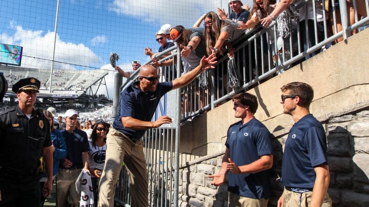 Penn State football coach James Franklin celebrates with fans after a Nittany Lions victory at Beaver Stadium. 