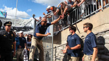 Penn State coach James Franklin celebrates with fans at Beaver Stadium. 