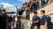 Penn State football coach James Franklin celebrates with fans after a Nittany Lions win at Beaver Stadium. 