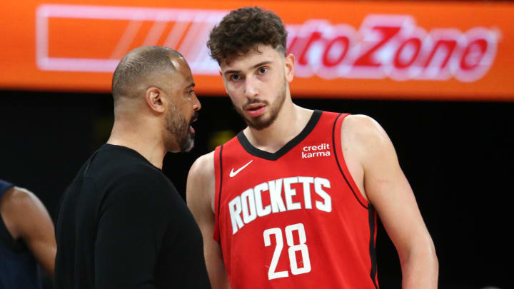 Feb 14, 2024; Memphis, Tennessee, USA; Houston Rockets head coach Ime Udoka (left) talks with center Alperen Sengun (28) during the first half against the Memphis Grizzlies at FedExForum. Mandatory Credit: Petre Thomas-USA TODAY Sports