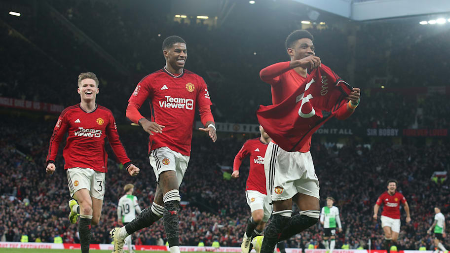Amad Diallo (right) celebrating.