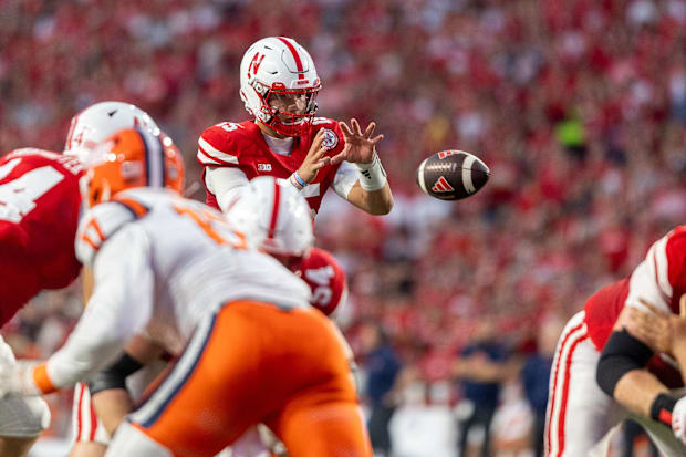Nebraska quarterback Dylan Raiola takes a snap against Illinois.