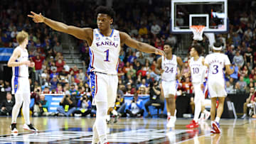 Then-Kansas Jayhawks guard Joseph Yesufu (1) reacts after a Jayhawks score against the Arkansas Razorbacks during the first half at Wells Fargo Arena.