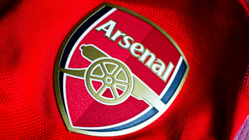 In this photo illustration a English Arsenal team logo sewn...
