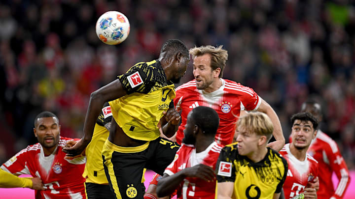 Harry Kane setzte sich gegen Guirassy vor dem 1:0 durch Harry Kane setzte sich gegen Guirassy vor dem 1:0 durch