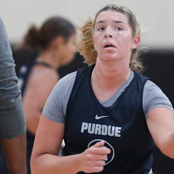 Purdue Boilermakers forward Alaina Harper (32) passes the ball 
