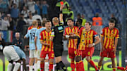 Referee Michael Fabbri shows the red card to Santiago...