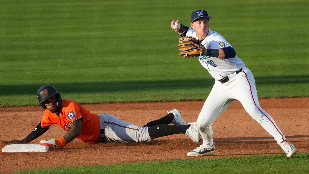 Blue Rocks infielder Eli Willits steps up on a throw to second to assist on an out at home plate as the Frederick Keys attempt a double steal, June 23, 2026 at Frawley Stadium.