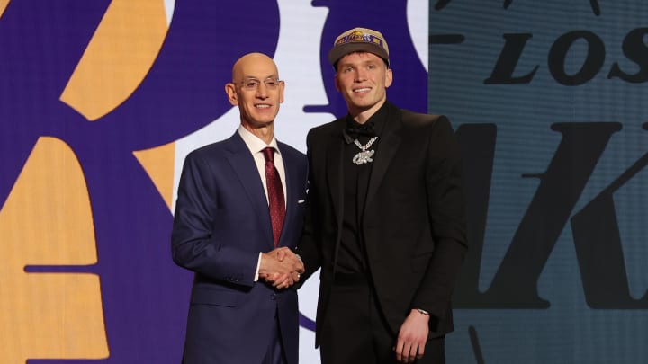 Jun 26, 2024; Brooklyn, NY, USA; Dalton Knecht poses for photos with NBA commissioner Adam Silver after being selected in the first round by the Los Angeles Lakers in the 2024 NBA Draft at Barclays Center. Mandatory Credit: Brad Penner-USA TODAY Sports