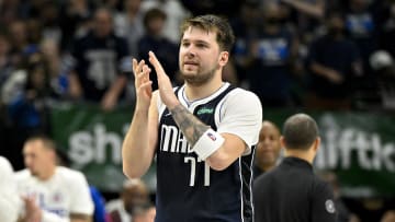 Apr 26, 2024; Dallas, Texas, USA; Dallas Mavericks guard Luka Doncic (77) celebrates during the fourth quarter against the LA Clippers during game three of the first round for the 2024 NBA playoffs at the American Airlines Center. Mandatory Credit: Jerome Miron-USA TODAY Sports