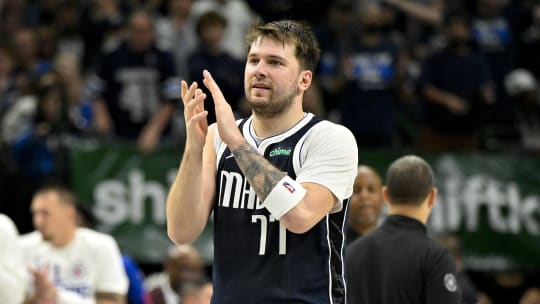 Apr 26, 2024; Dallas, Texas, USA; Dallas Mavericks guard Luka Doncic (77) celebrates during the fourth quarter against the LA Clippers during game three of the first round for the 2024 NBA playoffs at the American Airlines Center. Mandatory Credit: Jerome Miron-USA TODAY Sports