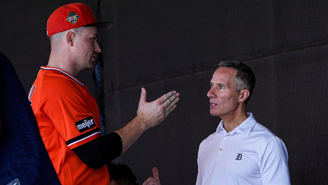 Detroit Tigers pitcher Tarik Skubal, left, talks to team owner Chris Ilitch at practice during spring training at TigerTown in Lakeland, Fla. on Friday, Feb. 20, 2026.