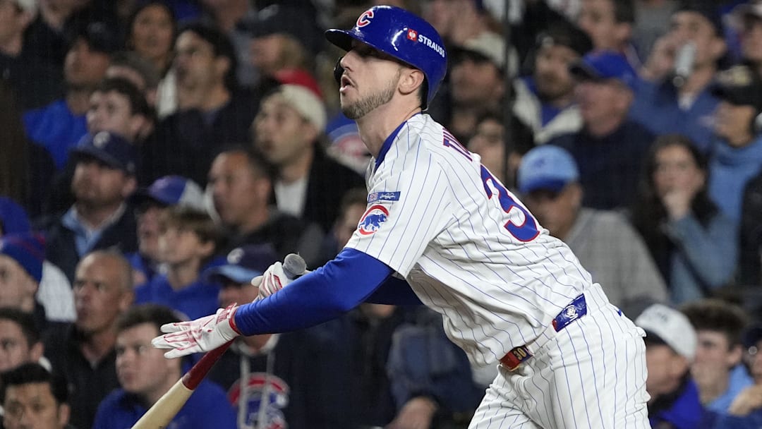 Oct 9, 2025; Chicago, Illinois, USA; Chicago Cubs right fielder Kyle Tucker (30) hits a home run against the Milwaukee Brewers during the seventh inning for game four of the NLDS round for the 2025 MLB playoffs at Wrigley Field. Mandatory Credit: David Banks-Imagn Images