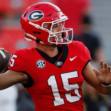 Georgia quarterback Carson Beck (15) warms up before the start of a NCAA college football game against UAB in Athens, Ga., on Saturday, Sept. 23, 2023.