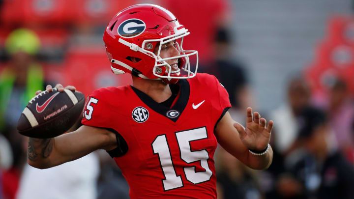 Georgia quarterback Carson Beck (15) warms up before the start of a NCAA college football game against UAB in Athens, Ga., on Saturday, Sept. 23, 2023.
