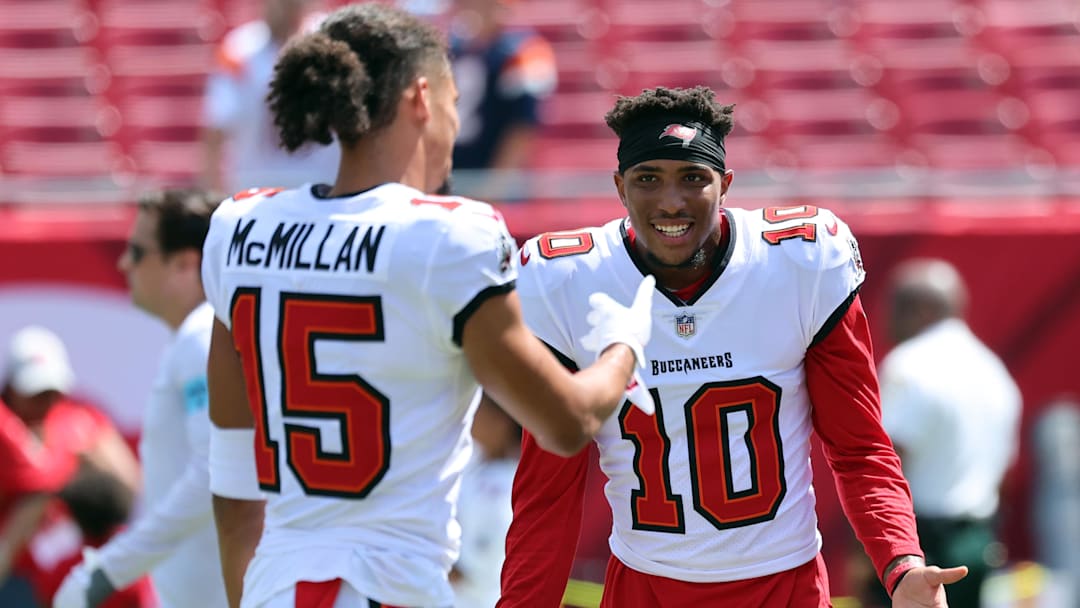 Sep 22, 2024; Tampa, Florida, USA;  Tampa Bay Buccaneers wide receiver Trey Palmer (10) and wide receiver Jalen McMillan (15) workout prior the game against the Denver Broncos at Raymond James Stadium. Mandatory Credit: Kim Klement Neitzel-Imagn Images