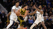 Dec 16, 2023; San Francisco, California, USA; Brooklyn Nets forward Cameron Johnson (2) and guard Mikal Bridges (1) double team Golden State Warriors guard Stephen Curry (30) during the fourth quarter at Chase Center. 