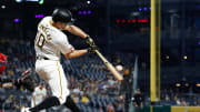 Jul 22, 2024; Pittsburgh, Pennsylvania, USA;  Pittsburgh Pirates left fielder Bryan Reynolds (10) hits a single against the St. Louis Cardinals during the eighth inning at PNC Park. Pittsburgh won 2-1. Mandatory Credit: Charles LeClaire-USA TODAY Sports