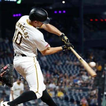 Pittsburgh Pirates left fielder Bryan Reynolds (10) hits a single against the St. Louis Cardinals during the eighth inning at PNC Park in 2024.