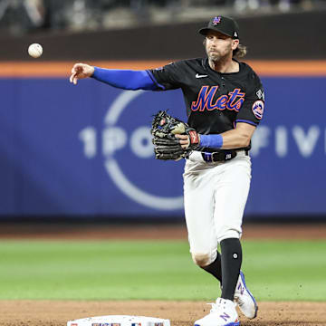 Sep 2, 2024; New York City, New York, USA;  New York Mets second baseman Jeff McNeil (1) throws past Boston Red Sox designated hitter Masataka Yoshida (7) to complete a double play in the fifth inning at Citi Field. Mandatory Credit: Wendell Cruz-Imagn Images