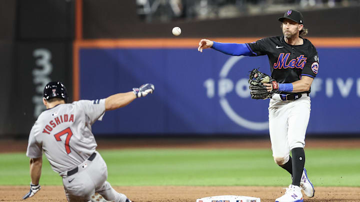 Sep 2, 2024; New York City, New York, USA;  New York Mets second baseman Jeff McNeil (1) throws past Boston Red Sox designated hitter Masataka Yoshida (7) to complete a double play in the fifth inning at Citi Field. Mandatory Credit: Wendell Cruz-Imagn Images