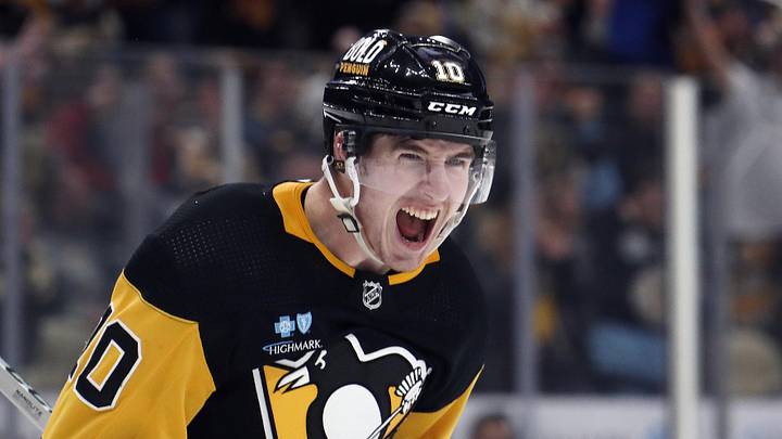 Feb 20, 2024; Pittsburgh, Pennsylvania, USA; Pittsburgh Penguins left wing Drew O'Connor (10) reacts after scoring a goal against the New York Islanders during the third period at PPG Paints Arena. New York won 5-4 in overtime.Mandatory Credit: Charles LeClaire-Imagn Images