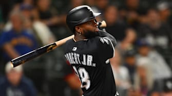 Chicago White Sox center fielder Luis Robert Jr. (88) hits a home run against the Seattle Mariners at T-Mobile Park. 