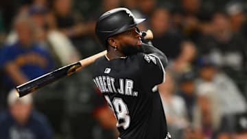 Chicago White Sox center fielder Luis Robert Jr. (88) hits a home run against the Seattle Mariners at T-Mobile Park. 