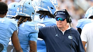 Sep 7, 2024; Chapel Hill, North Carolina, USA;  North Carolina Tar Heels head coach Mack Brown with his players in the second quarter at Kenan Memorial Stadium. Mandatory Credit: Bob Donnan-Imagn Images