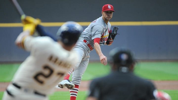 Jun 21, 2022; Milwaukee, Wisconsin, USA;  St. Louis Cardinals starting pitcher Jack Flaherty (22) gives up a home run to Milwaukee Brewers shortstop Willy Adames (27) in the first inning at American Family Field. Mandatory Credit: Michael McLoone-USA TODAY Sports