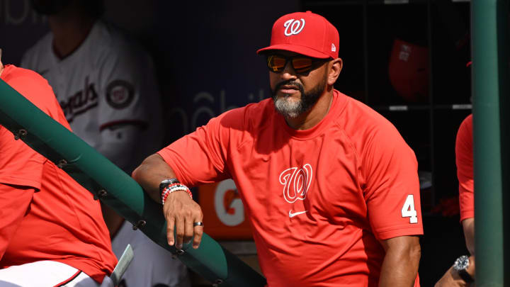 Jul 8, 2024; Washington, District of Columbia, USA; Washington Nationals manager Dave Martinez (4) watches from the dugout against the St. Louis Cardinals during the fifth inning at Nationals Park.