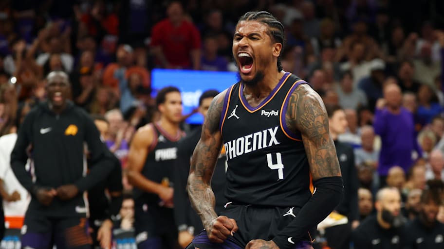 Phoenix Suns guard Jalen Green celebrates after a slam dunk against the Golden State Warriors.