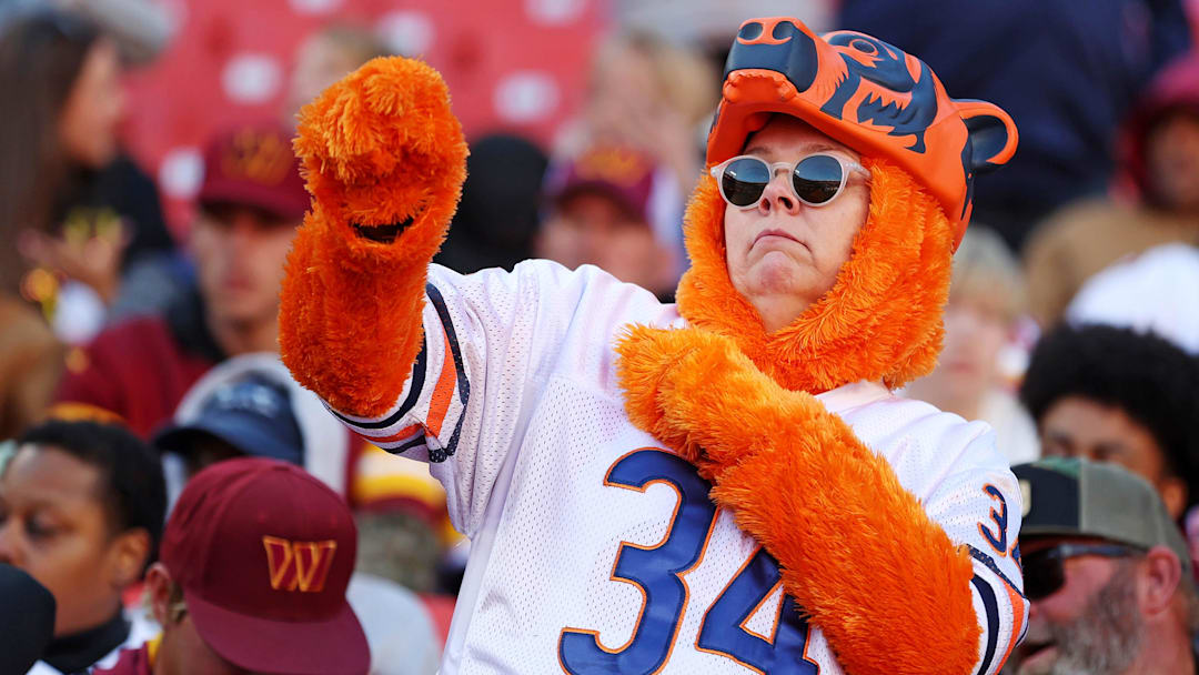 Oct 27, 2024; Landover, Maryland, USA; A Chicago Bears fans dances before the game between the Washington Commanders and the Chicago Bears at Commanders Field. Mandatory Credit: Peter Casey-Imagn Images